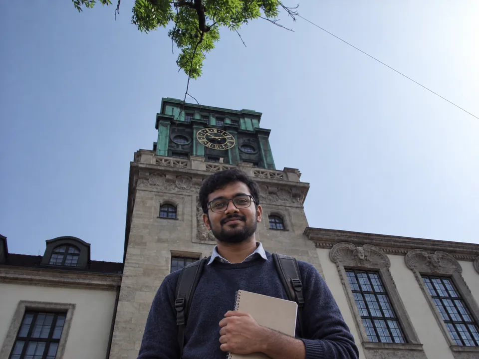 Indian engineering student in front of the Technical University of Munich